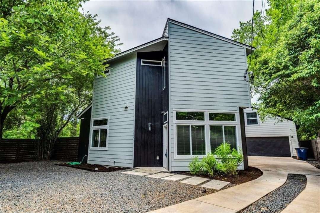 Front exterior of 5609 Tura Lane Unit A, contemporary home in East Austin Texas
