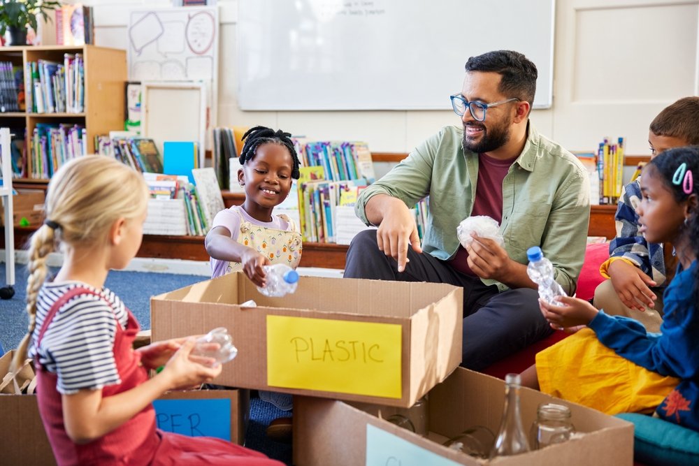 Preschool classroom with young students learning about recycling