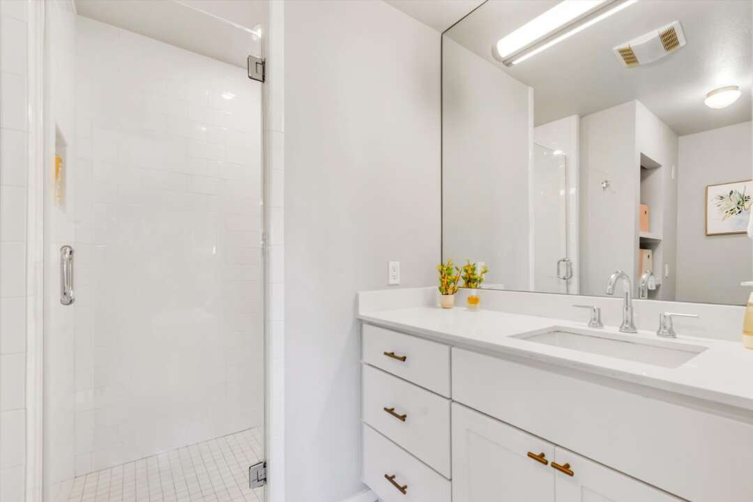 Primary ensuite bathroom with glass shower