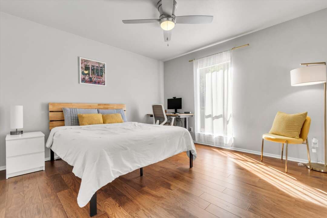 Second primary bedroom with hardwood floors