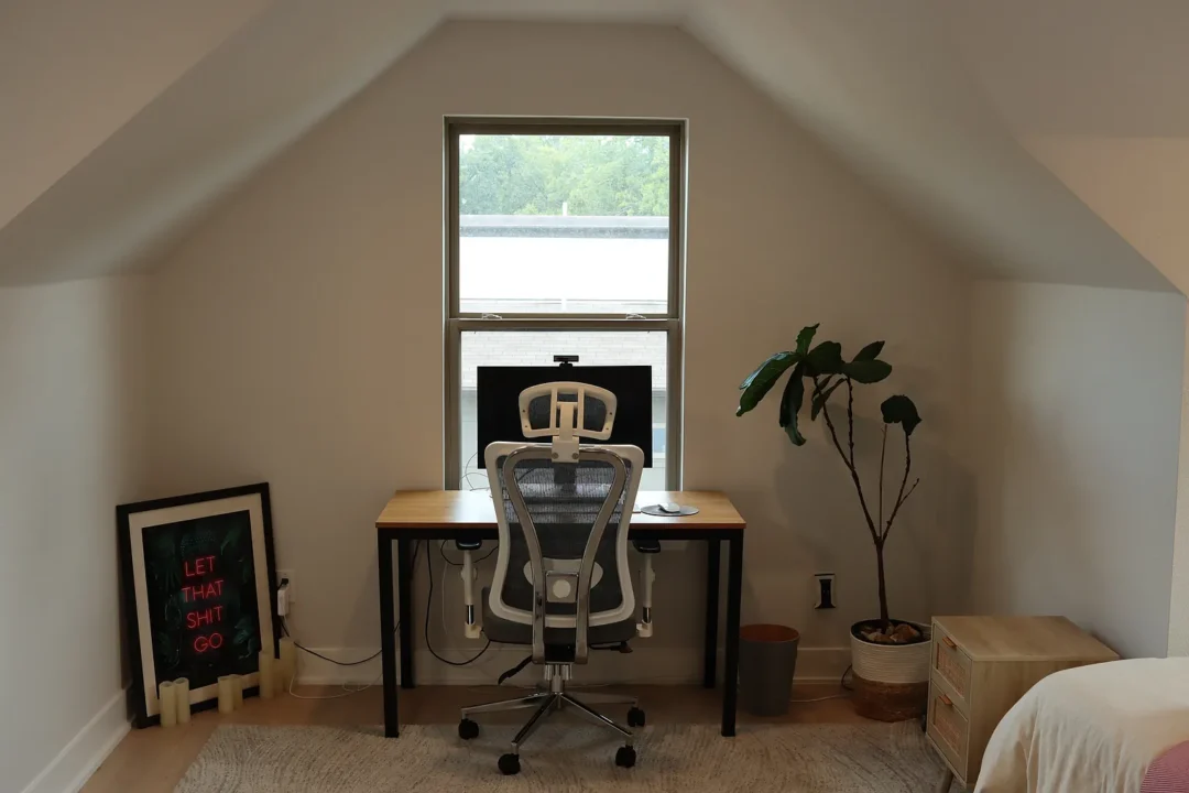 Third level staged as office workspace with desk