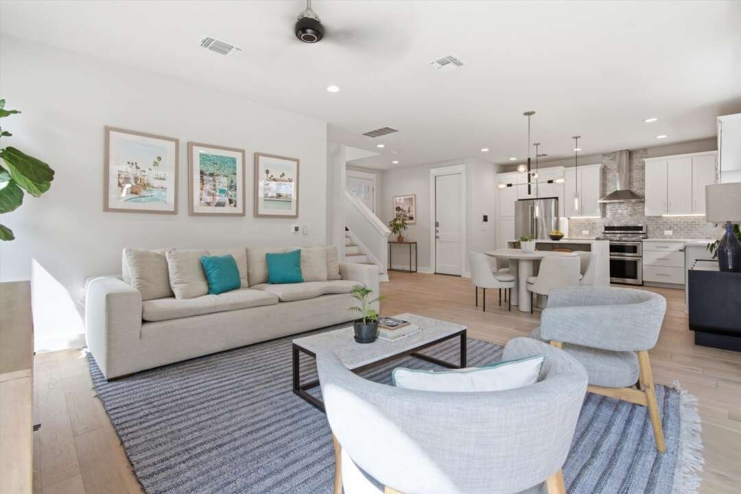 Light-filled living room open to kitchen