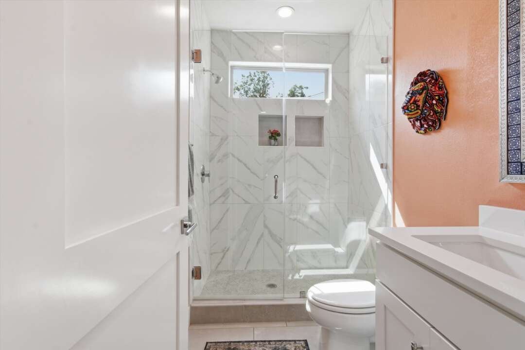 Primary bath with marble walk-in shower