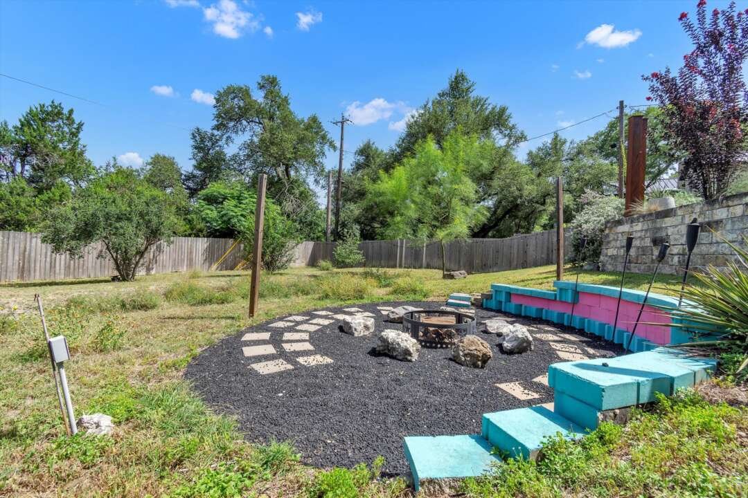 Backyard firepit lounge with built-in seating