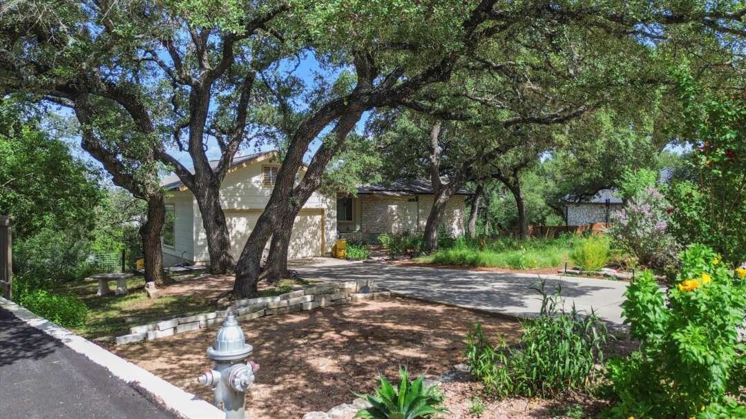 Large front lot and driveway approach