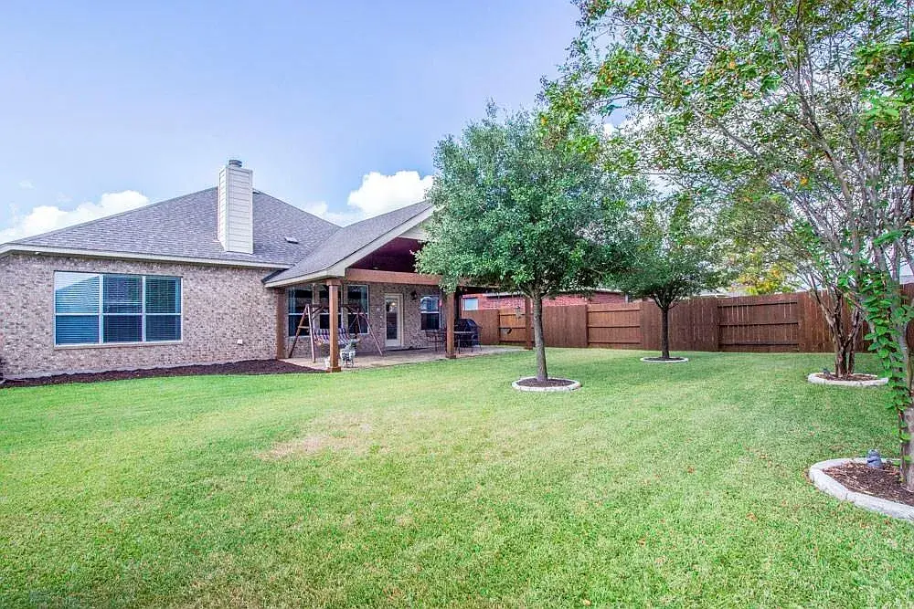 Backyard view at 13817 Glen Mark Dr