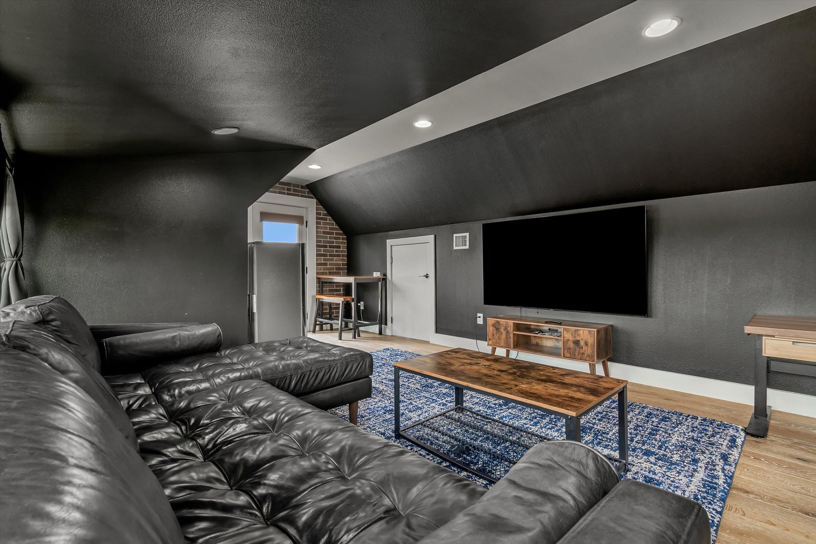 Lounge & TV Wall — 3010 East 18½ St