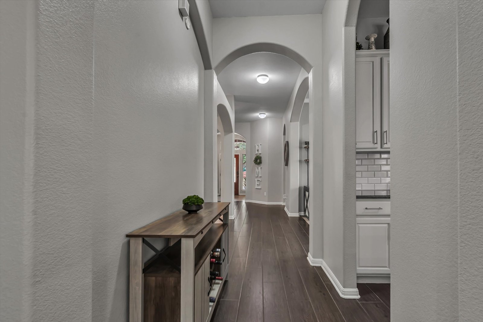 Wide entry hall with wood floors at 13817 Glen Mark Dr